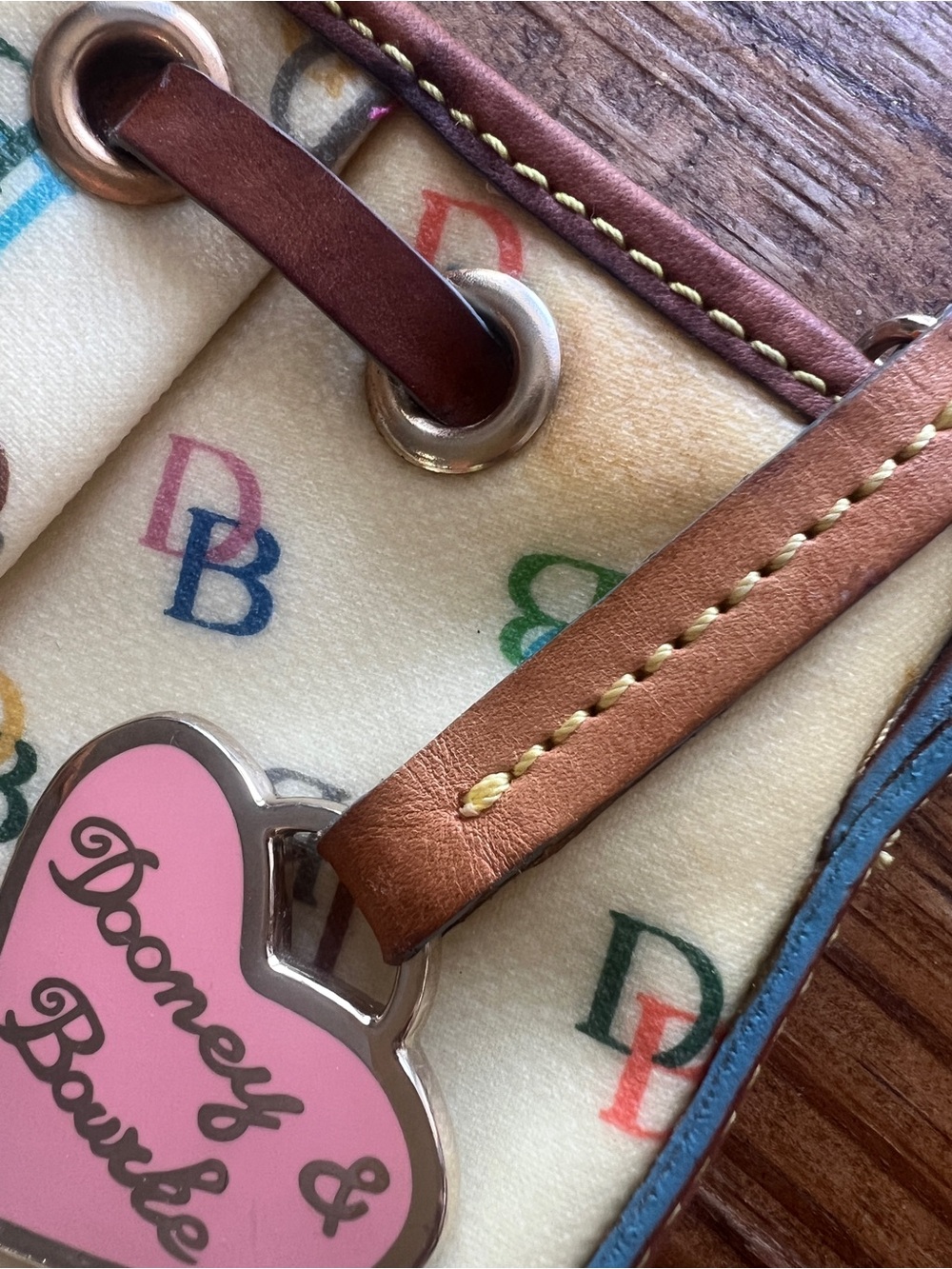 Dooney & Bourke Cream Multicolor DB Logo Drawstring Shoulder Bag - Picture 10 of 11